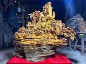 Tượng nhất tâm bái phật gỗ nhai bách