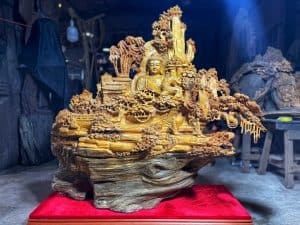 Tượng nhất tâm bái phật gỗ nhai bách